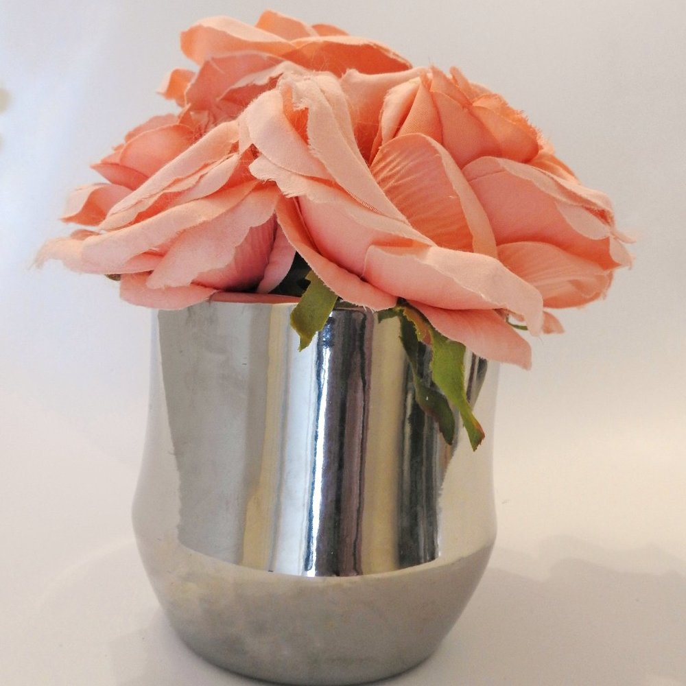FAUX ROSES IN SILVER VASE